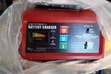 NEW BATTERY CHARGER WITH JUMPER CABLES