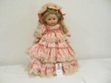 Porcelain Doll with pink dress and removeable wig