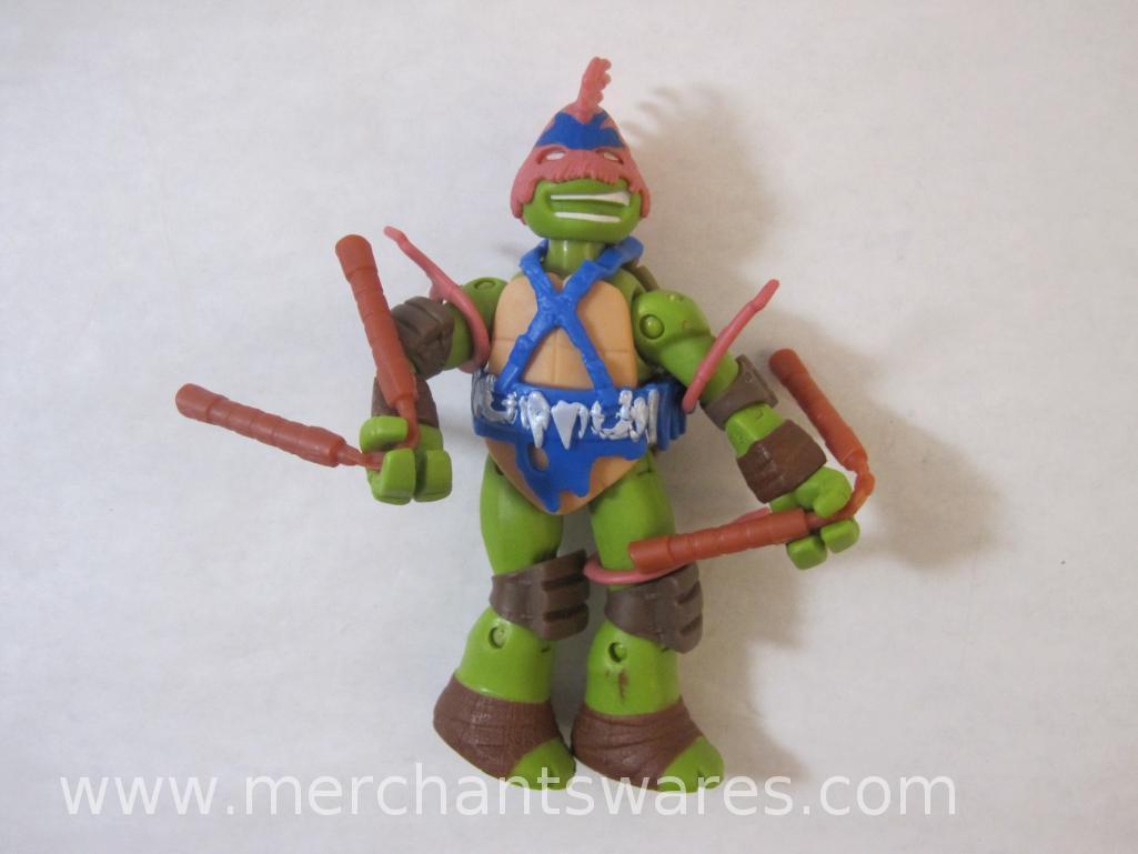 Four Teenage Mutant Ninja Turtles Action Figures including 2014 Head Dropping Leonardo, 2015