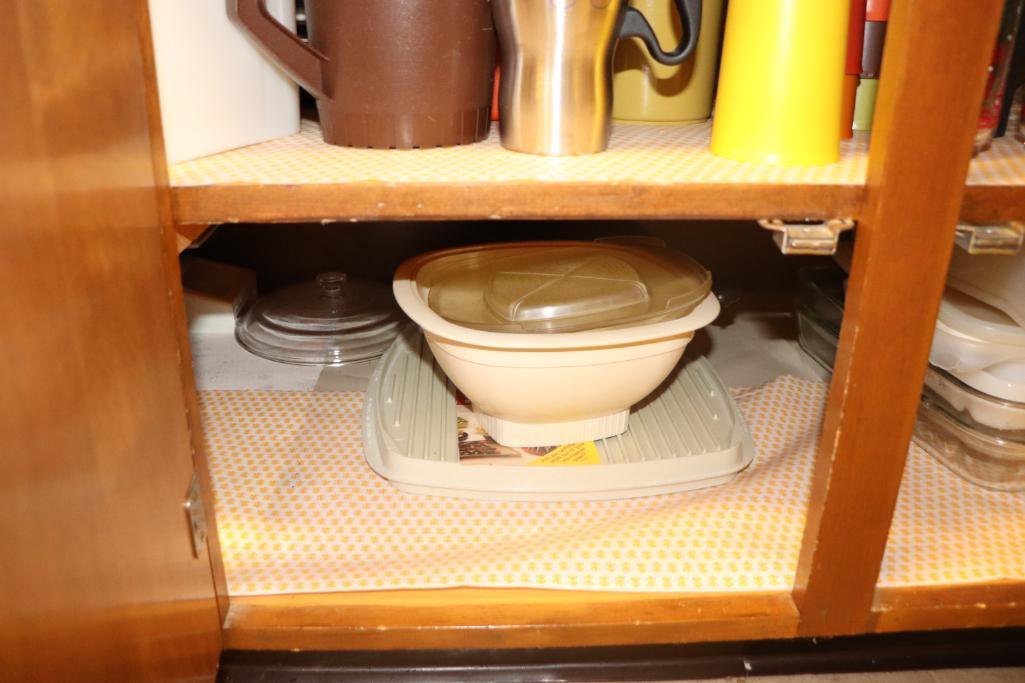 Contents of kitchen cabinets to include silverware, bakeware, Tupperware, etc.