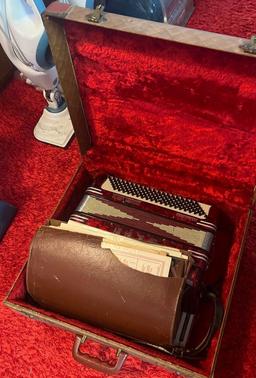 accordion in the case basement