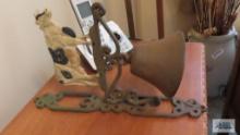 Ornamental cow and bell hanging decoration. No clapper in the bell.