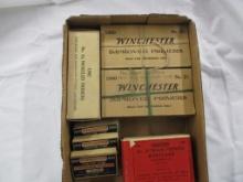 7 boxes vintage primers