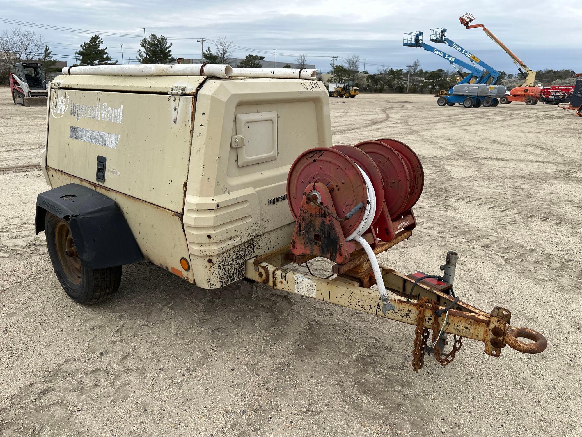 INGERSOLL RAND 185CFM AIR COMPRESSOR powered by diesel engine, equipped with 185CFM, trailer