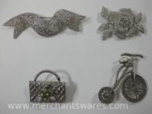 Four Silver Tone Glittery Pins, including Pocketbook and Bicycle