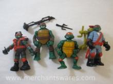 Four Teenage Mutant Ninja Turtles including 2013 Stealth Tech Raphael, 2012 Hand to Hand Ooze