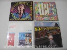 Four Vinyl Records includes Duran Duran: Girls on Film (Night Version), The Psychedelic Furs: Mirror