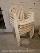 Six White Stacking Patio Chairs