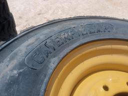 (4) Unused Skid Steer Wheels w/Caterpillar Tires 12-16.5