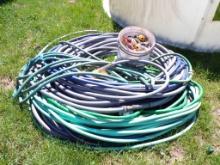 Large Group of Garden Hose and Bucket of Hose Connections (5150)