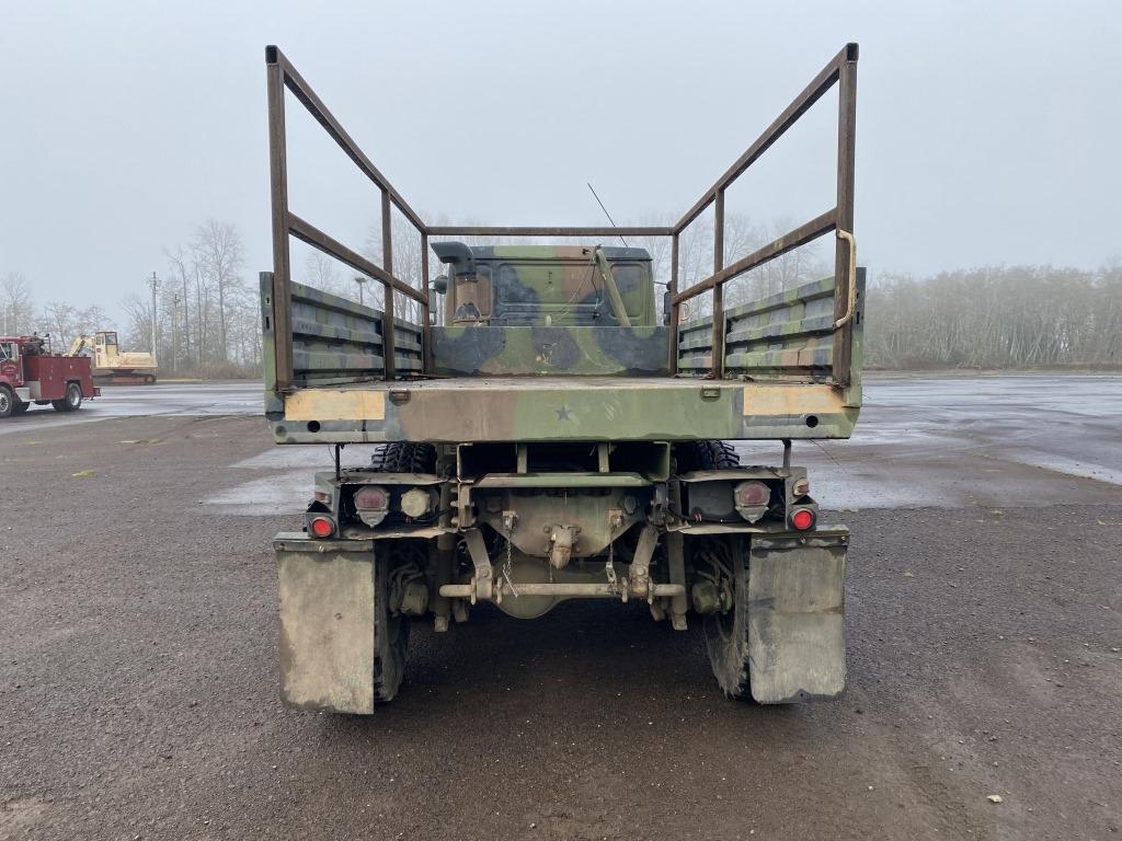 1999 S & S M1083A1 T/A Flatbed Truck