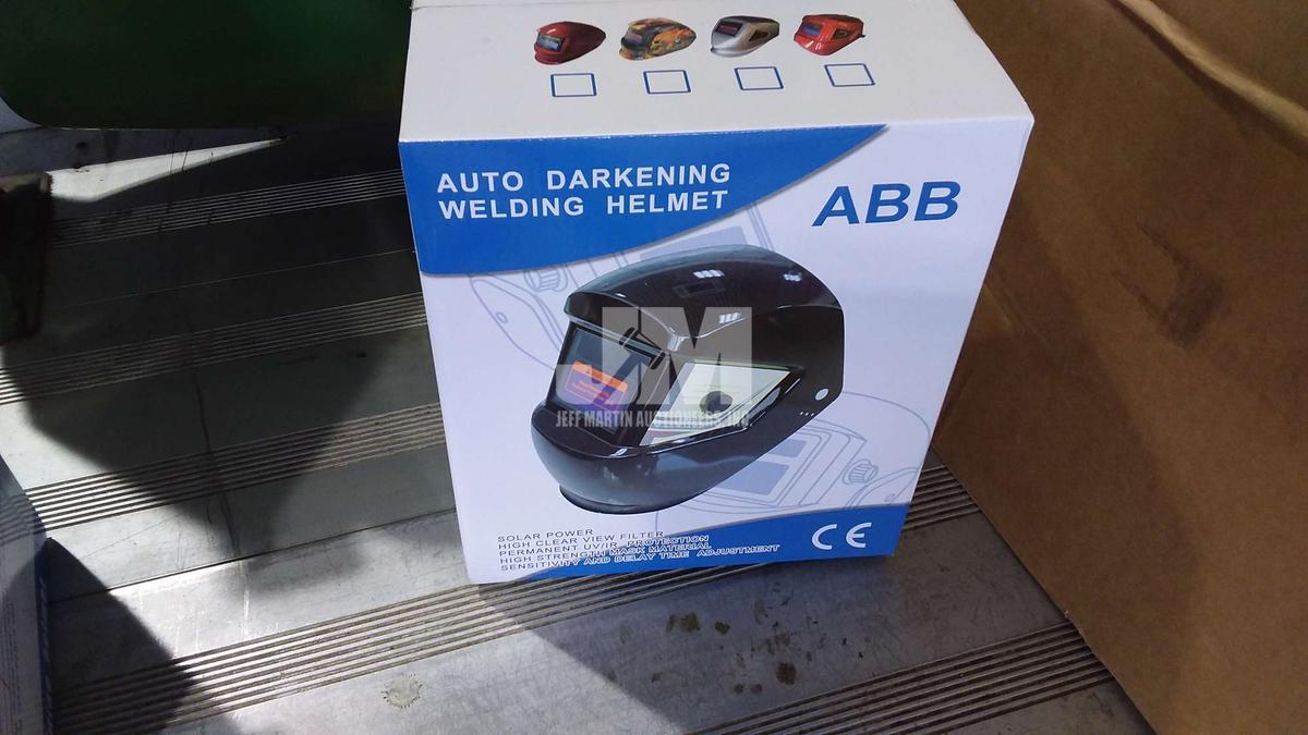 (UNUSED) AUTO DARKENING WELDING HELMET