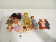 Assortment of collectibles dolls and cats