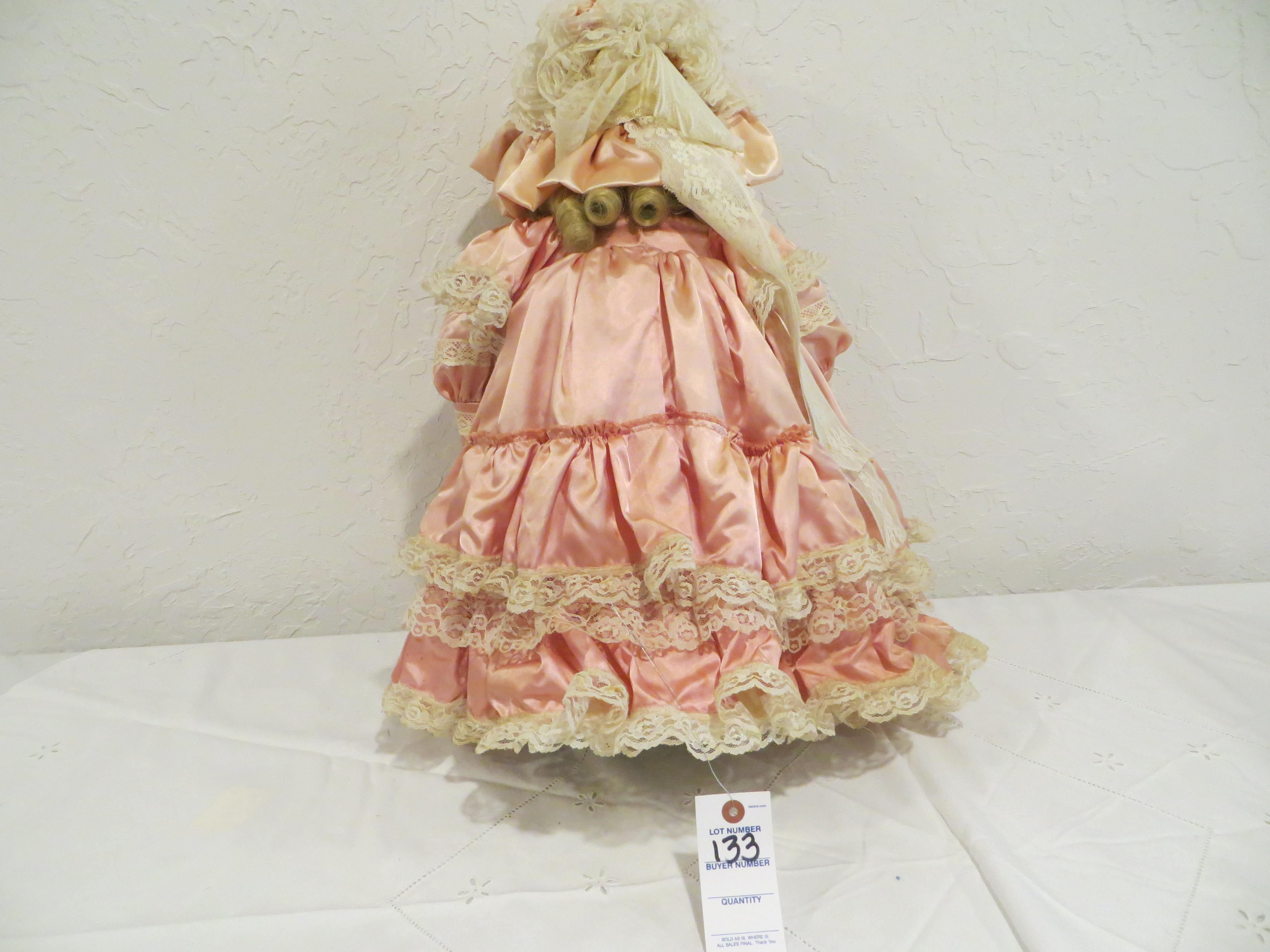 Porcelain Doll with pink dress and removeable wig