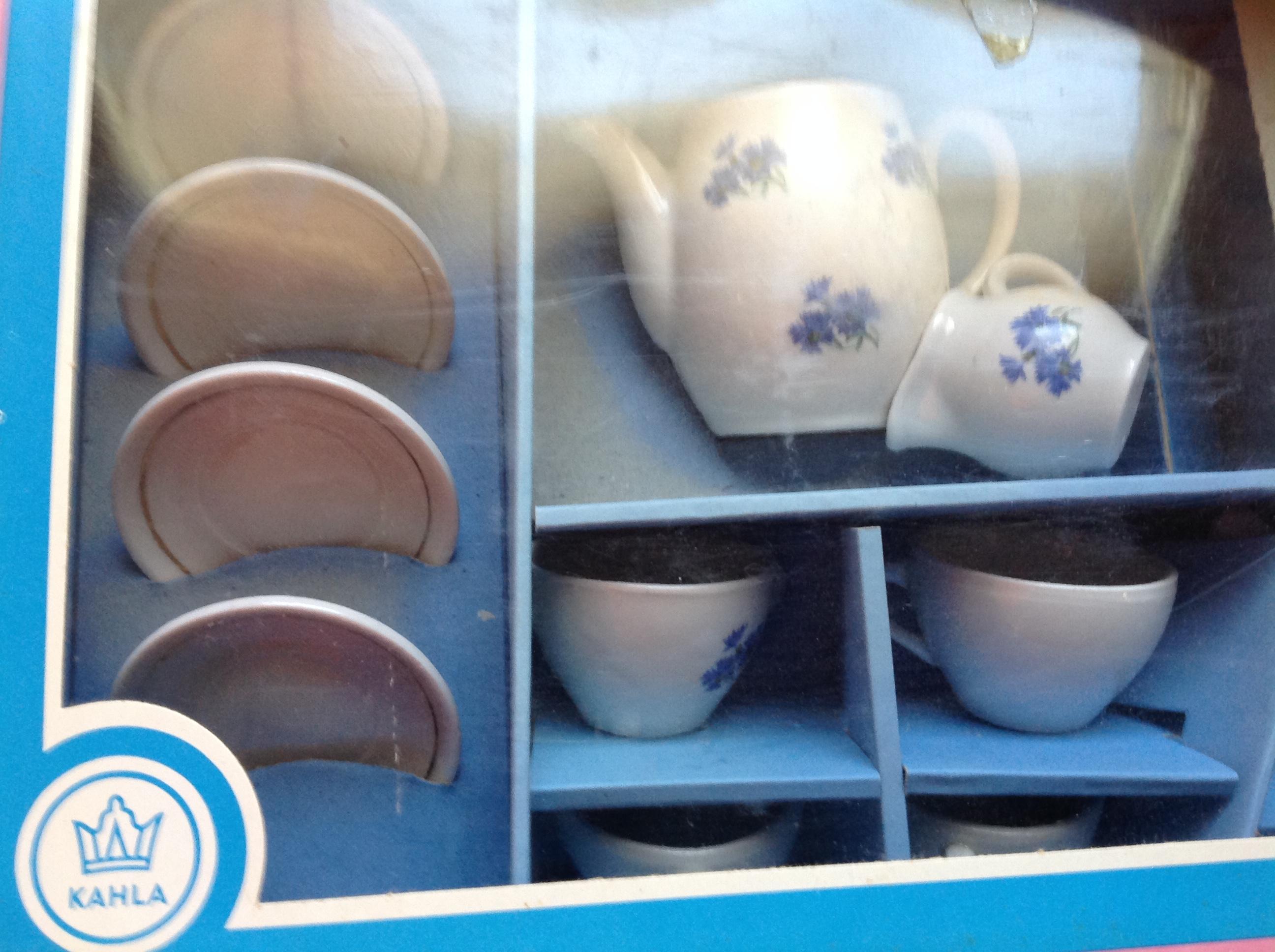 5 sets of China Toy tea sets. The blue set is missing a piece