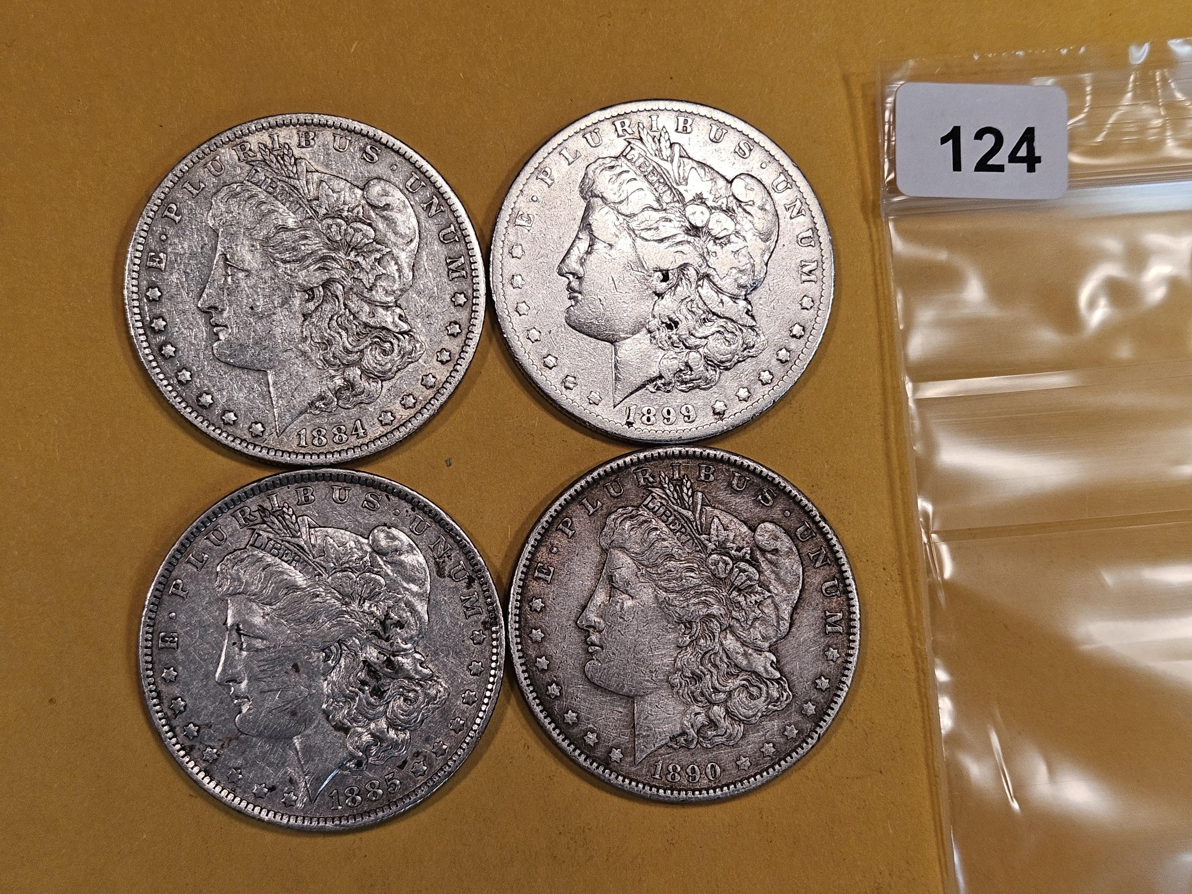 Four Mixed Silver Dollars