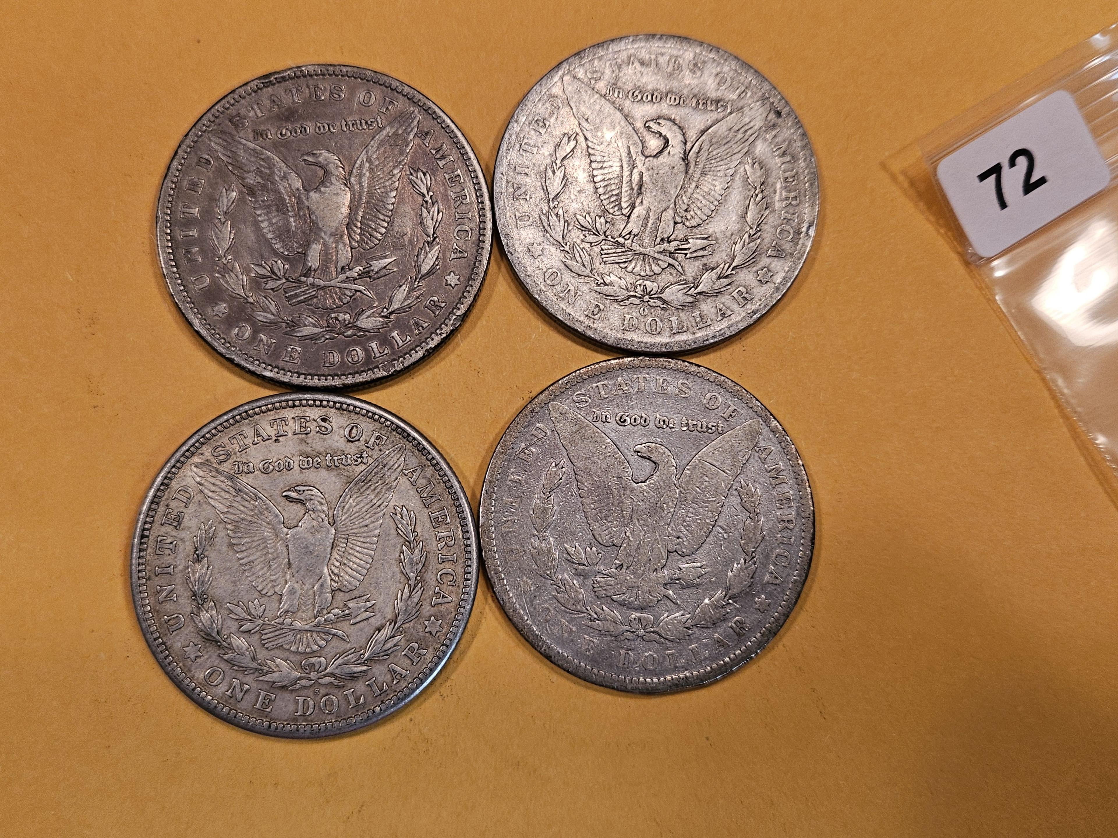 Four mixed Morgan Silver Dollars