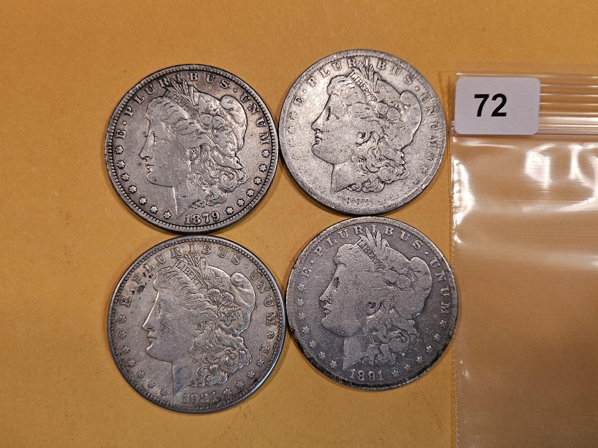 Four mixed Morgan Silver Dollars