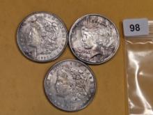 Three mixed Silver Dollars