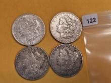 Four mixed Morgan Silver Dollars