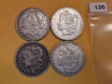 Four mixed Morgan Silver Dollars