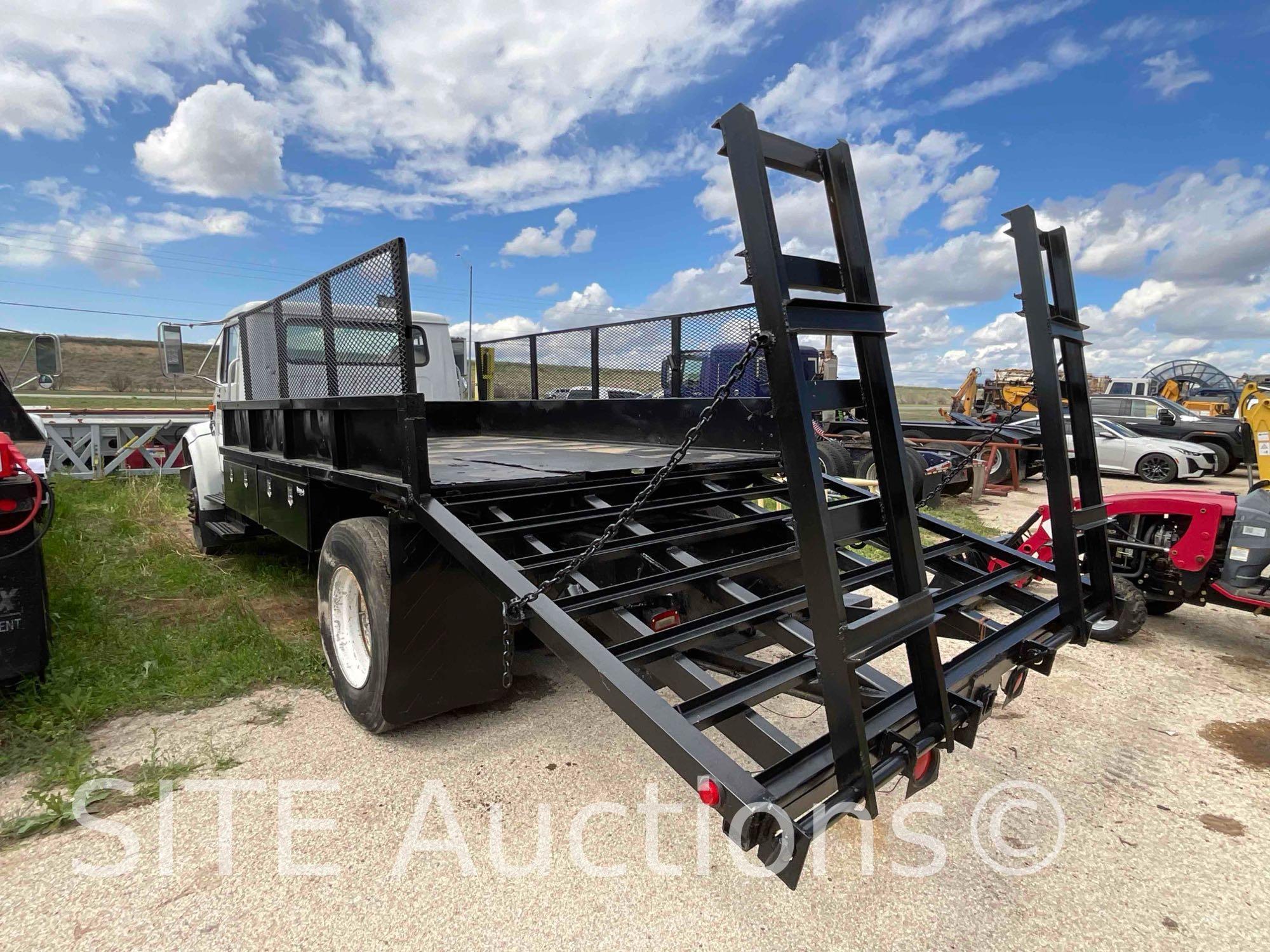 1998 InternationaL 4900 S/A Flatbed Truck w/ Ramps