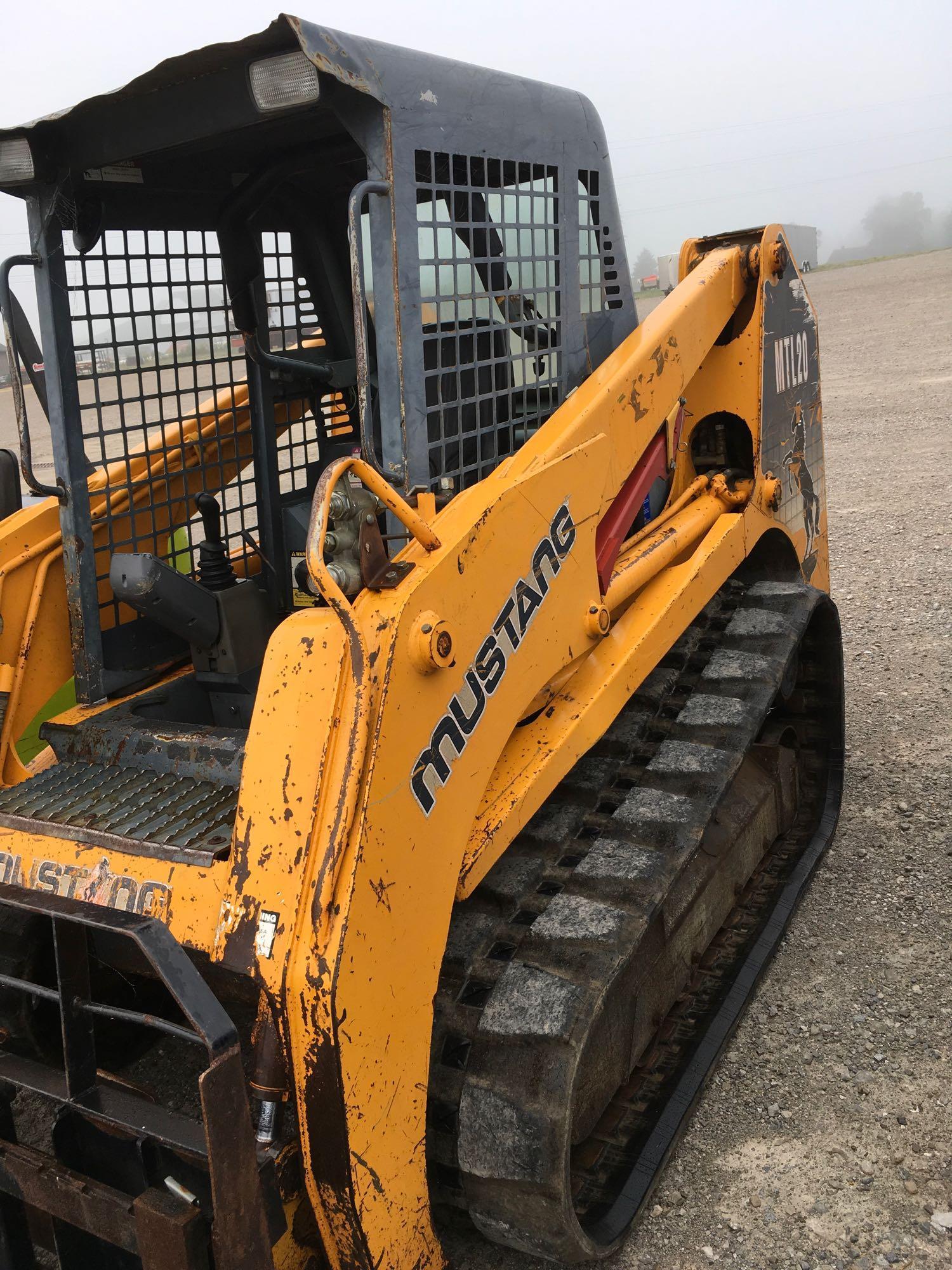 Mustang MTL 20 skid steer track loader with forks.