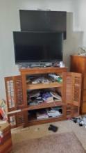 wooden hutch with Vizio model E370VT flat screen TV @ farm