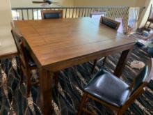 wood table and four chairs two leafs