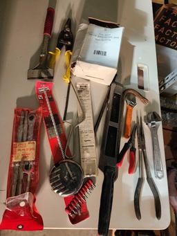 Box of miscellaneous tools, router speed control, screw drivers, wrenches, etc.