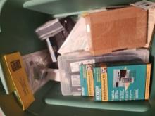 Box of electronic components, RS-232 interface kit, power and charging cables, etc.