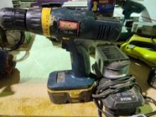 RYOBI 3/8" battery drill with charger and two batteries.