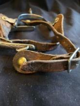Western spurs, etched trim, leather straps