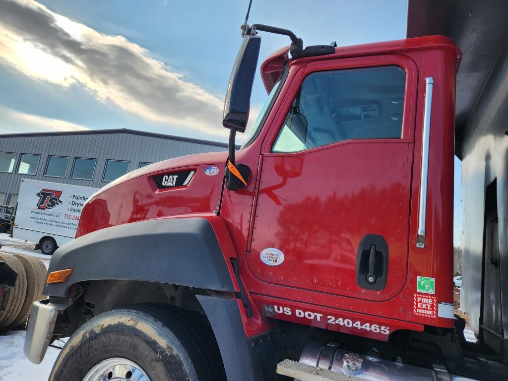 2014 Caterpillar Quad Axle Dump Truck