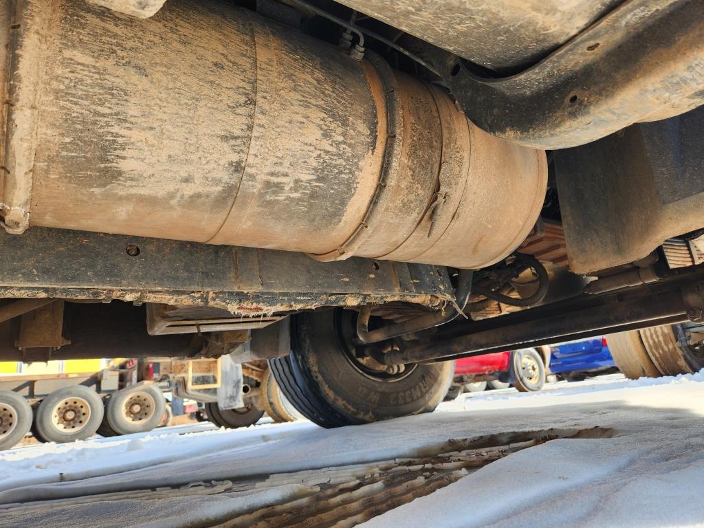 2014 Caterpillar Quad Axle Dump Truck