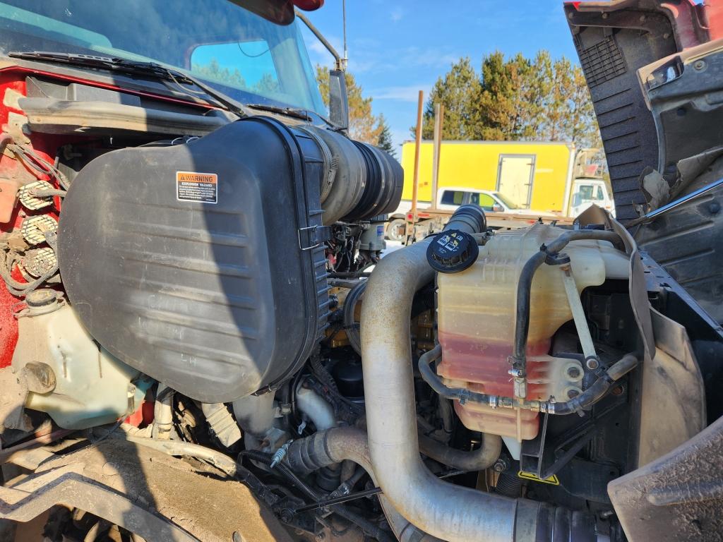 2014 Caterpillar Quad Axle Dump Truck