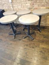 Round tables with metal pedestal base