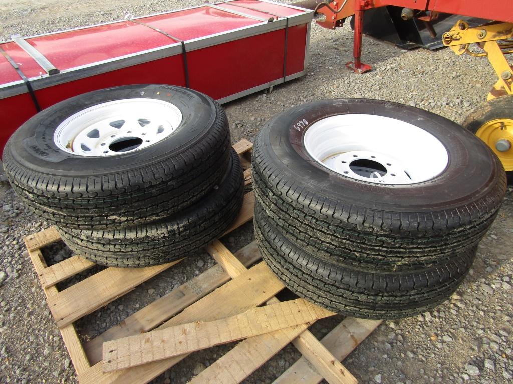 (4) NEW 235/80R16 TRAILER TIRES ON 8 LUG RIMS