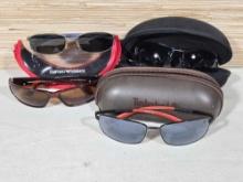 4 Pair of Pre-Owned Men's Sunglasses Incl. Oakley, Armani, & Timberland