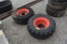 2 - SKID STEER TIRES AND WHEELS (12 X 16.5)