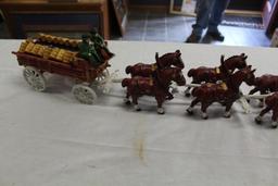 CAST IRON 8 HORSE WAGON WITH 2 MEN AND DOG,