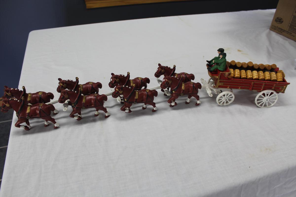 CAST IRON 8 HORSE WAGON WITH 2 MEN AND DOG,