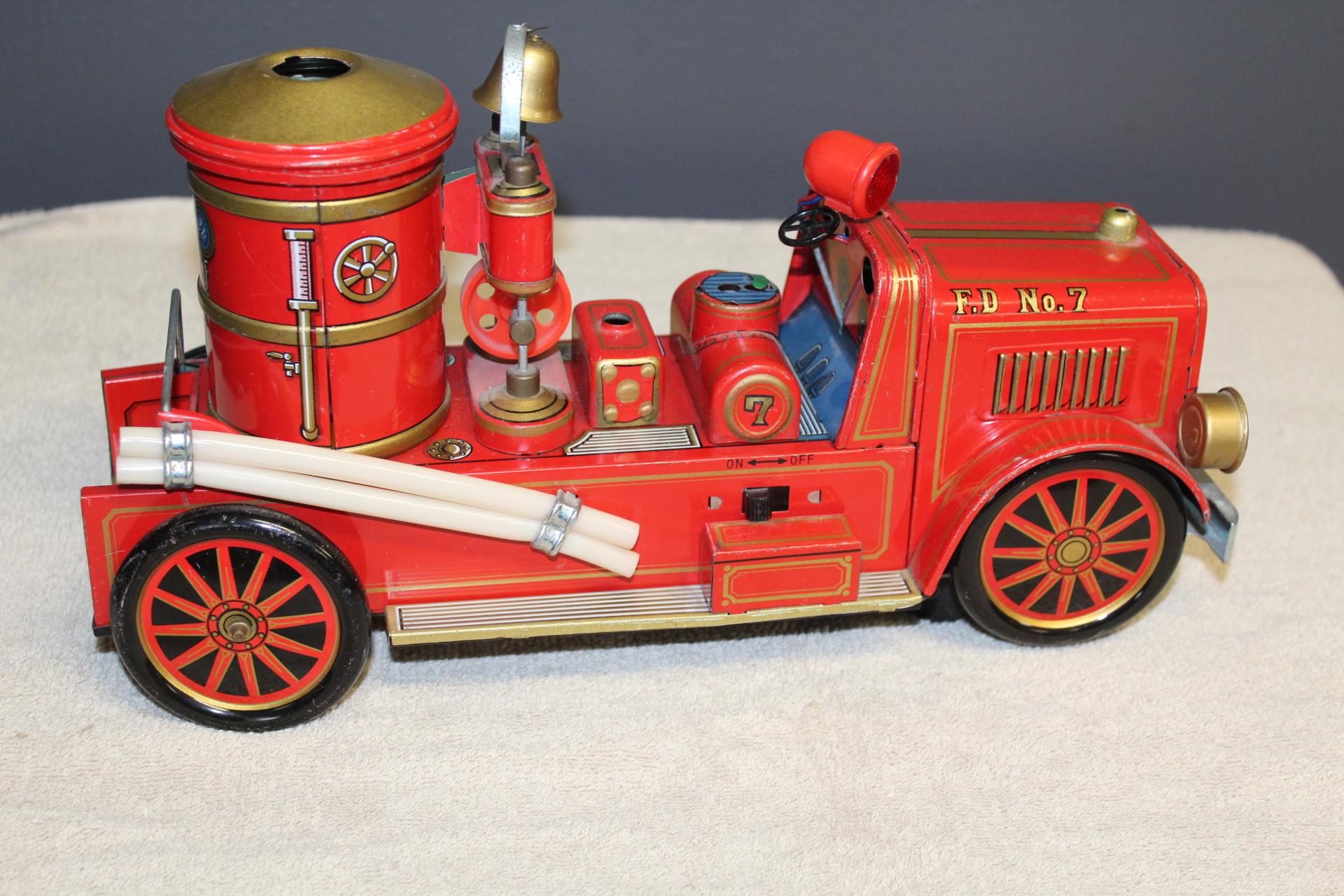 BATTERY OPERATED TIN FIRE TRUCK #7, NO BOX