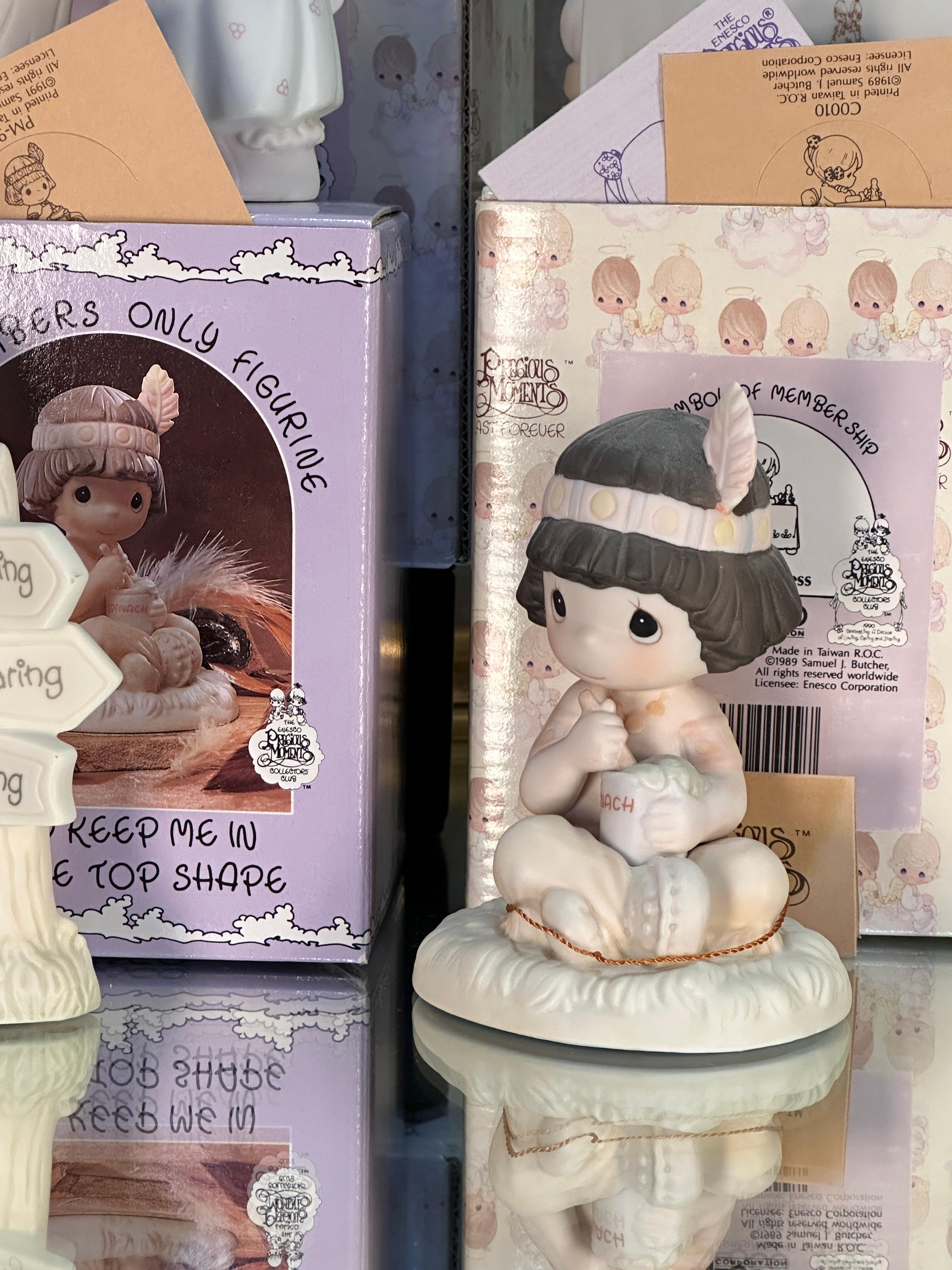 Precious Moments Figurine Collection with Tracking Book
