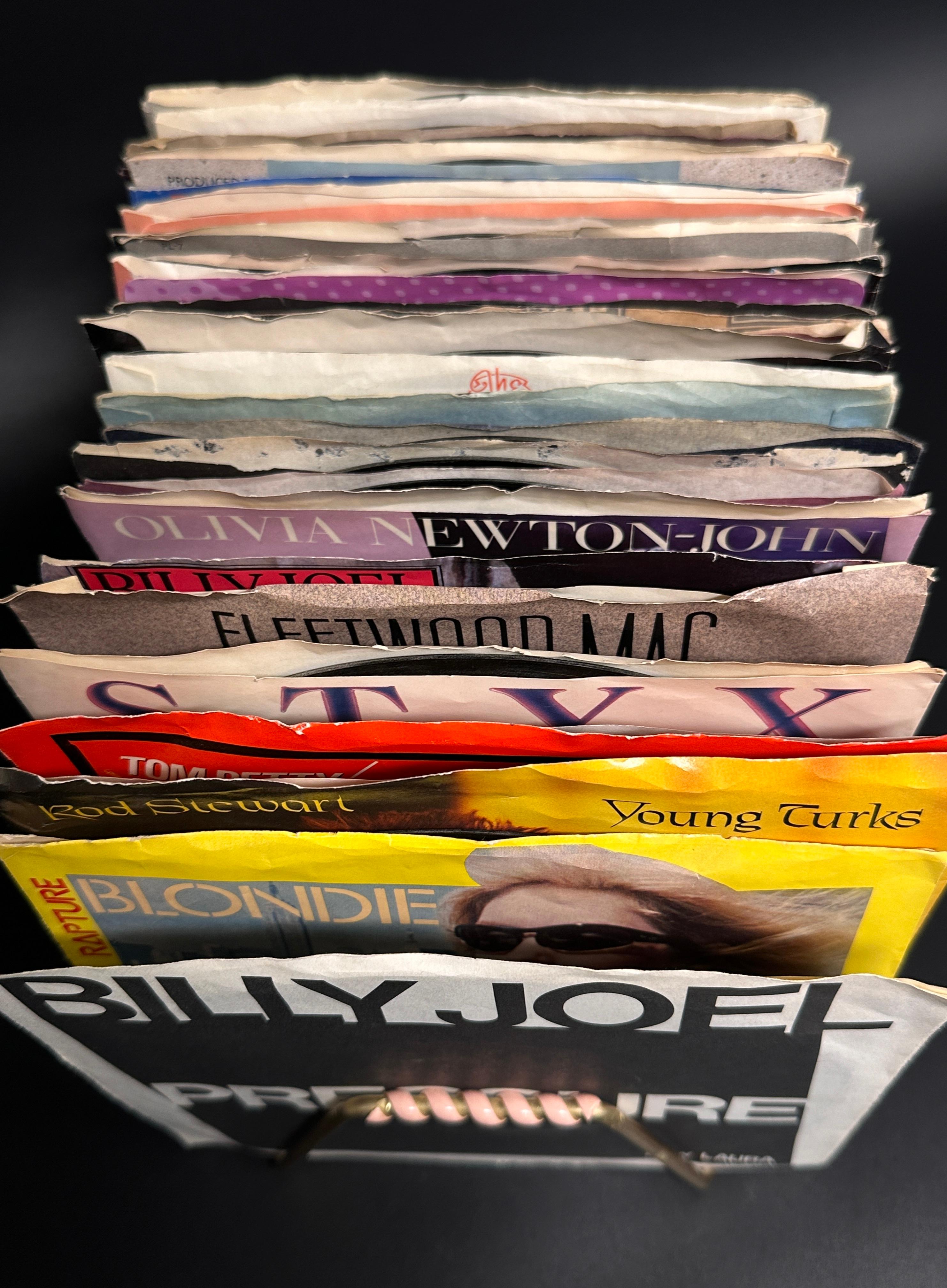 Assorted Vinyl 45 Records with Storage Rack