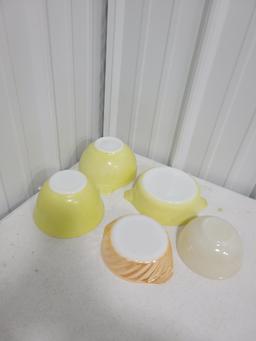 3 small yellow Pyrex bowls and 2 fire king bowls