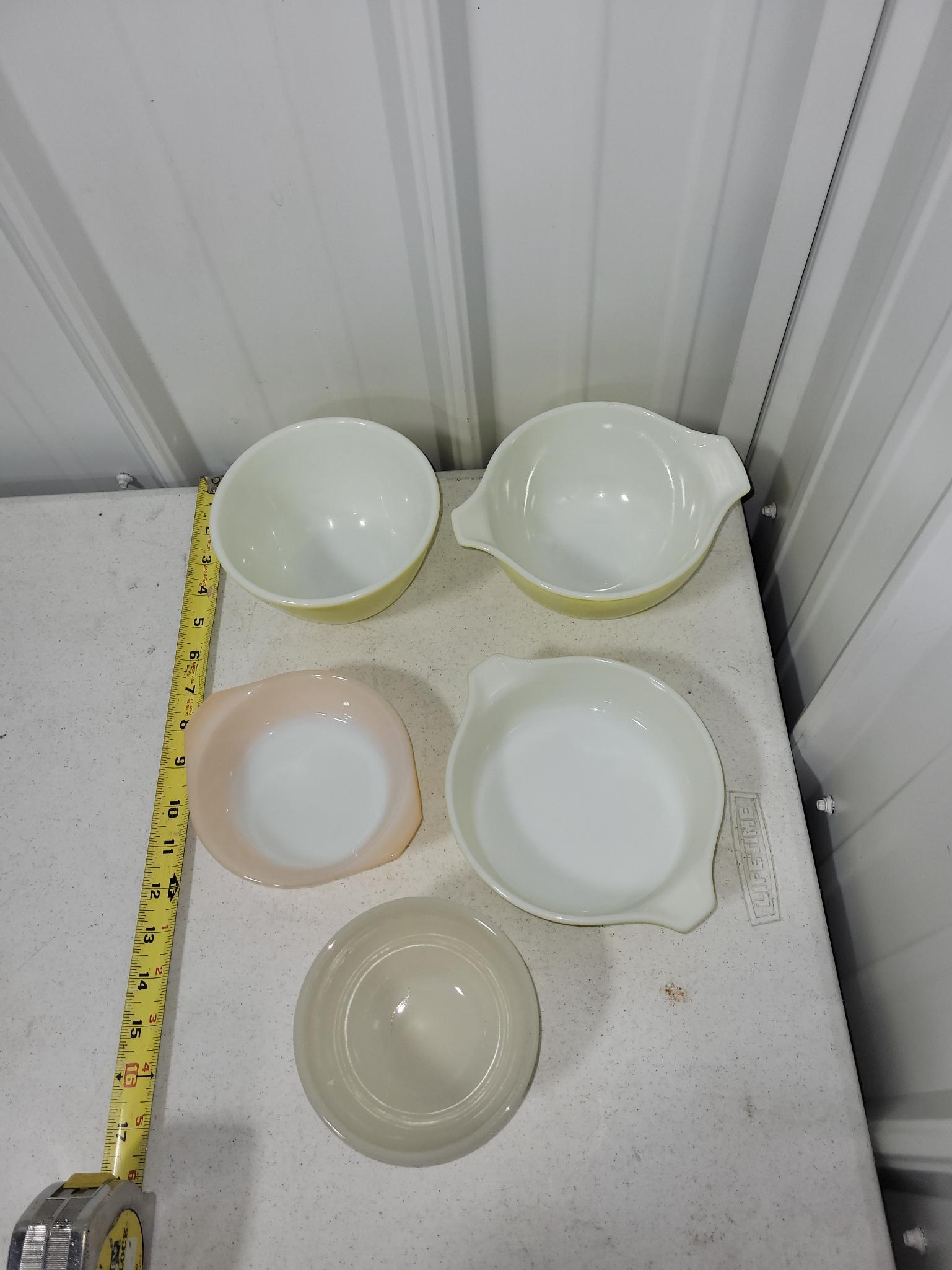 3 small yellow Pyrex bowls and 2 fire king bowls