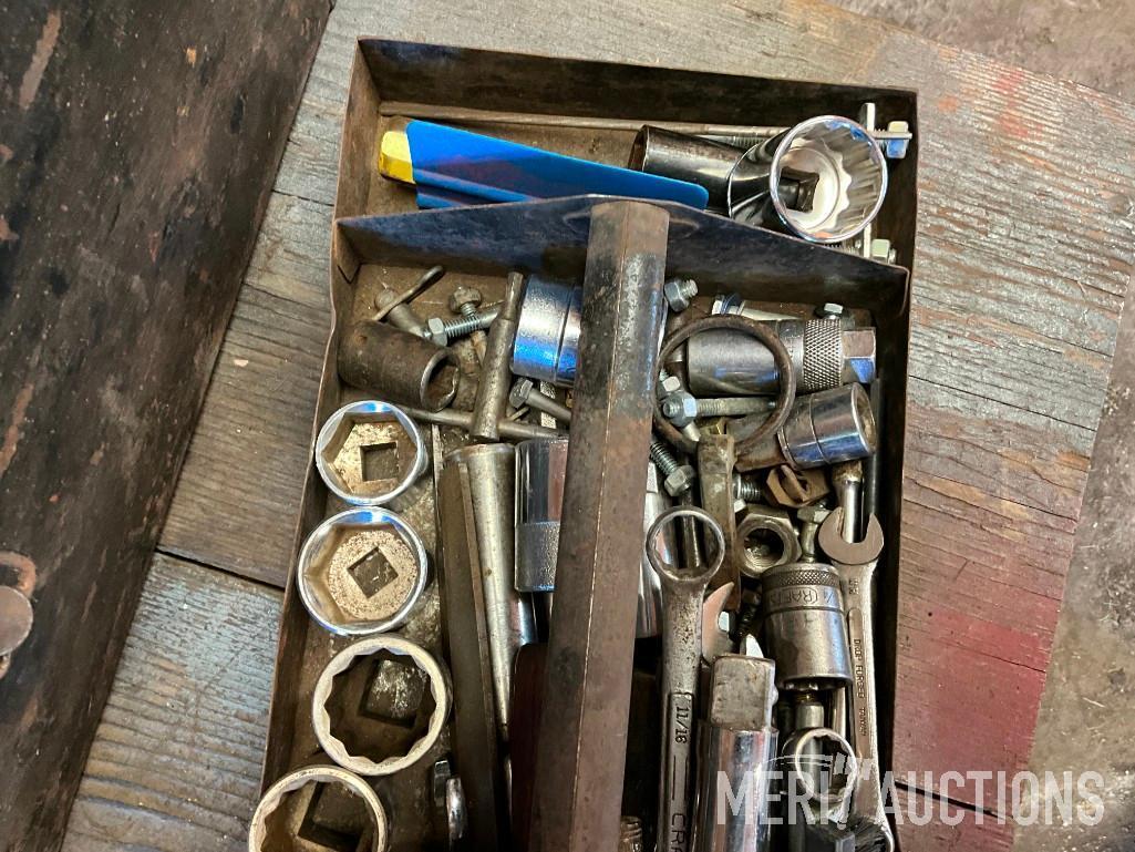 Metal tool box w/ assorted sockets, wrenches etc.