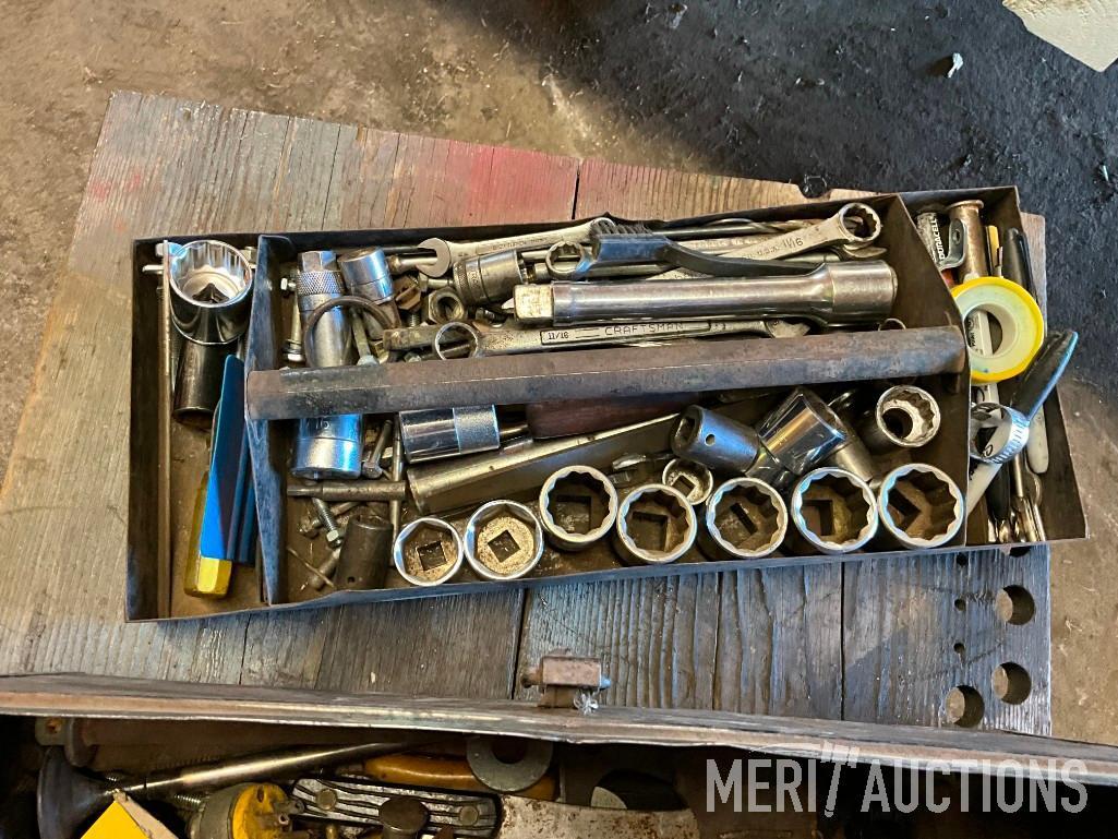 Metal tool box w/ assorted sockets, wrenches etc.