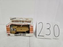 Ertl Mighty Movers IH hauler 350 #1852  1/64 scale poor condition box